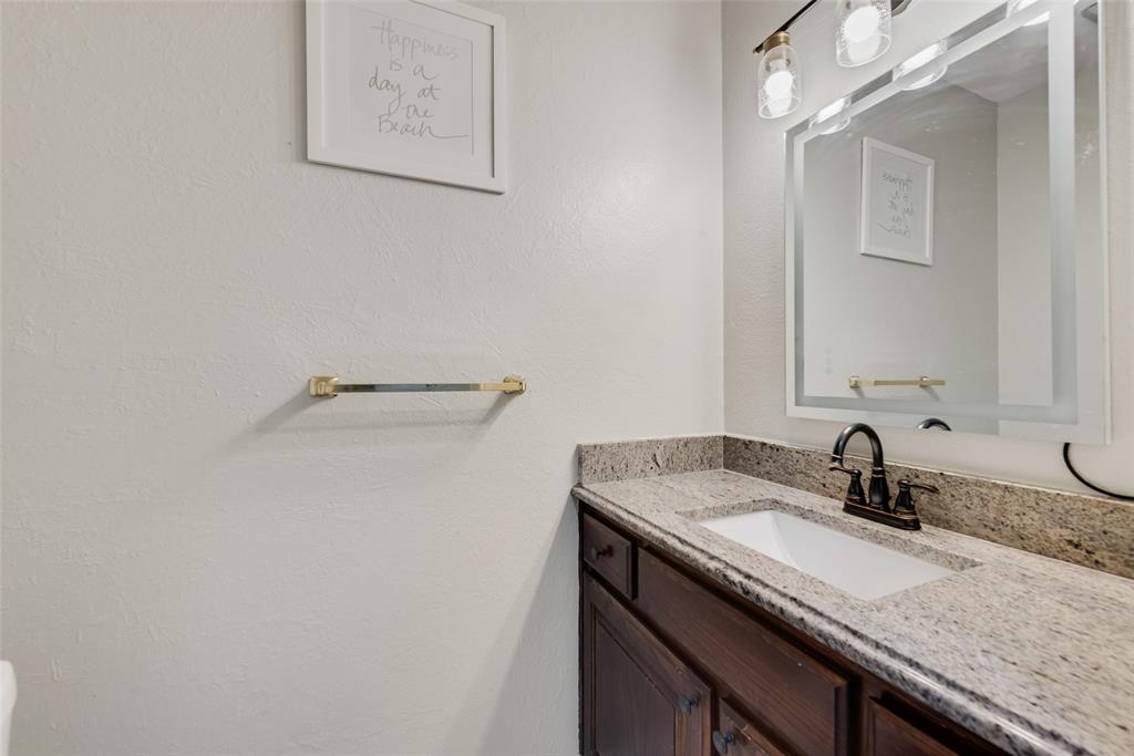 2629 Coldstream Drive Fort Worth, TX 76123 - Photo 15 of 24 a view of a double vanity sink and mirror