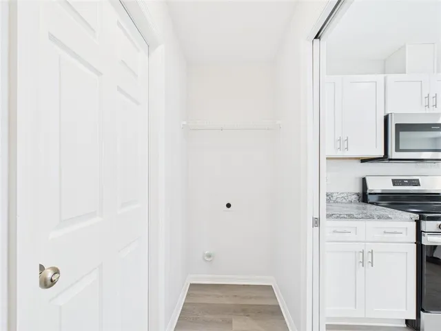 a view of a bathroom from a hallway