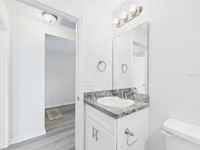 a view of a big room with carpet