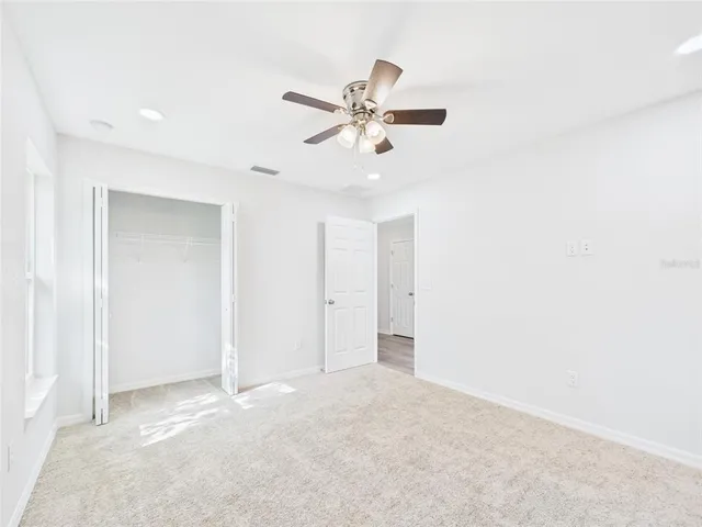 a view of empty room with an empty room