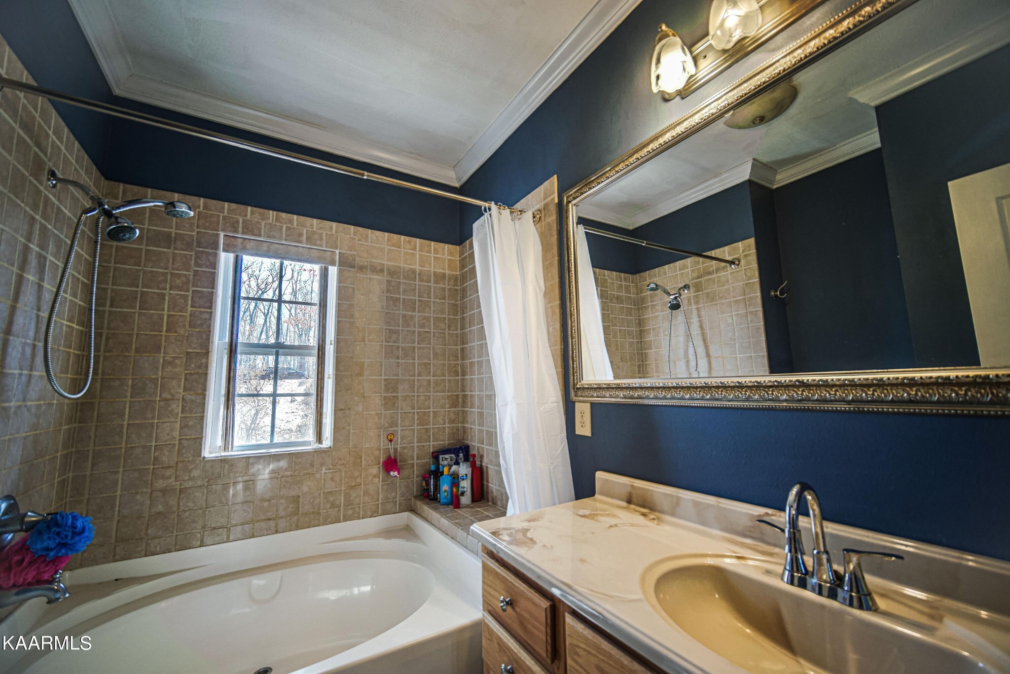 469 E Cove Monterey, TN 38574 - Photo 18 of 34 a bathroom with a sink and a bathtub