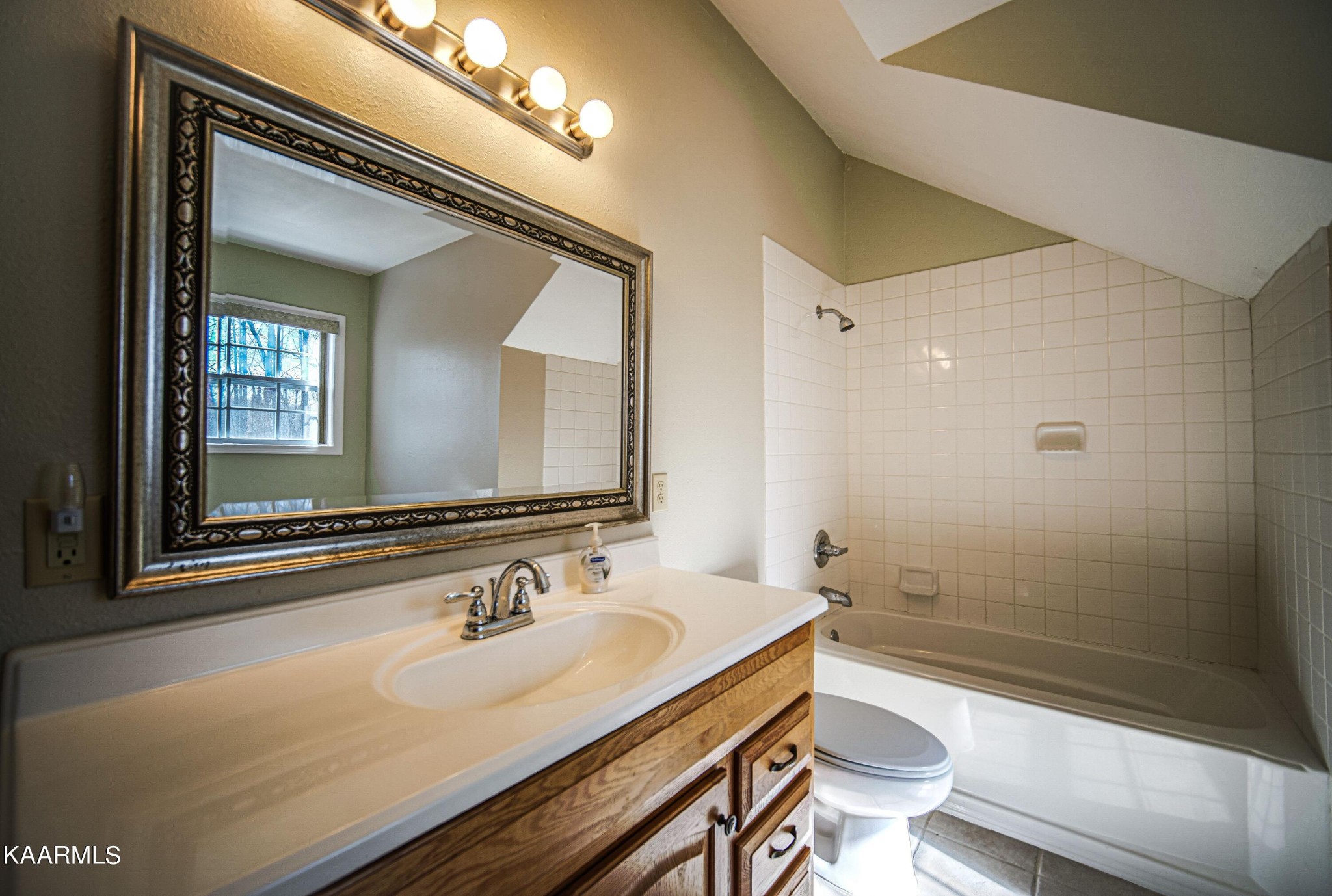 469 E Cove Monterey, TN 38574 - Photo 24 of 34 a bathroom with a sink a toilet a mirror and shower