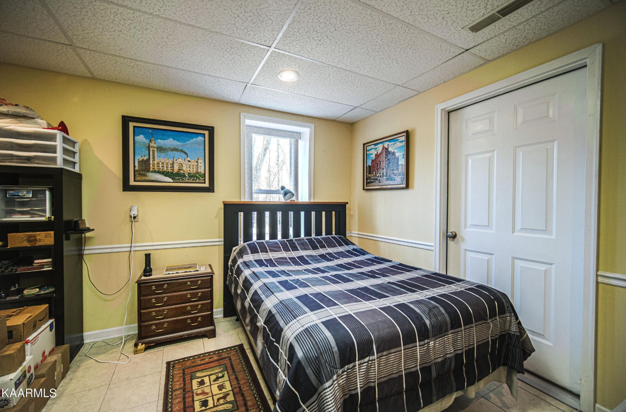 469 E Cove Monterey, TN 38574 - Photo 28 of 34 a bedroom with a bed and wooden floor