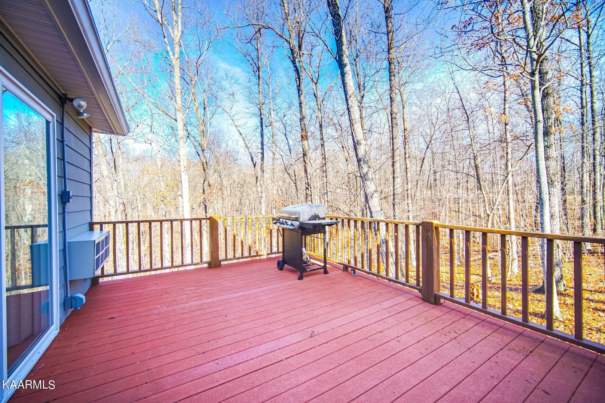 469 E Cove Monterey, TN 38574 - Photo 32 of 34 a view of a porch with wooden floor and fence