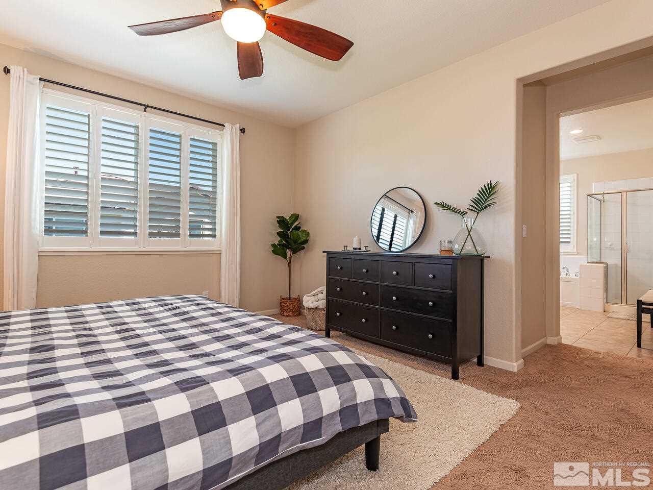 1985 Hope Valley Drive Reno, NV 89521 - Photo 12 of 19 a bedroom with a bed and a dresser