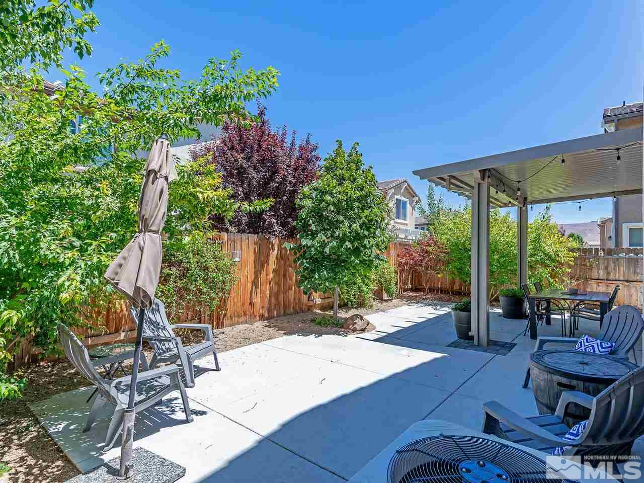 1985 Hope Valley Drive Reno, NV 89521 - Photo 18 of 19 a patio with table and chairs and potted plants