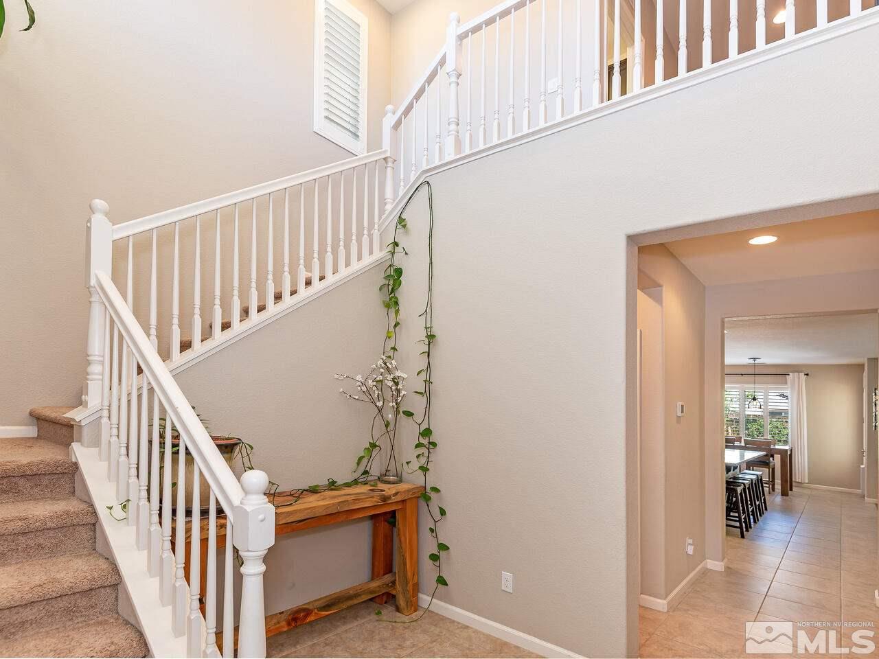 1985 Hope Valley Drive Reno, NV 89521 - Photo 2 of 19 a view of staircase with railing and white walls