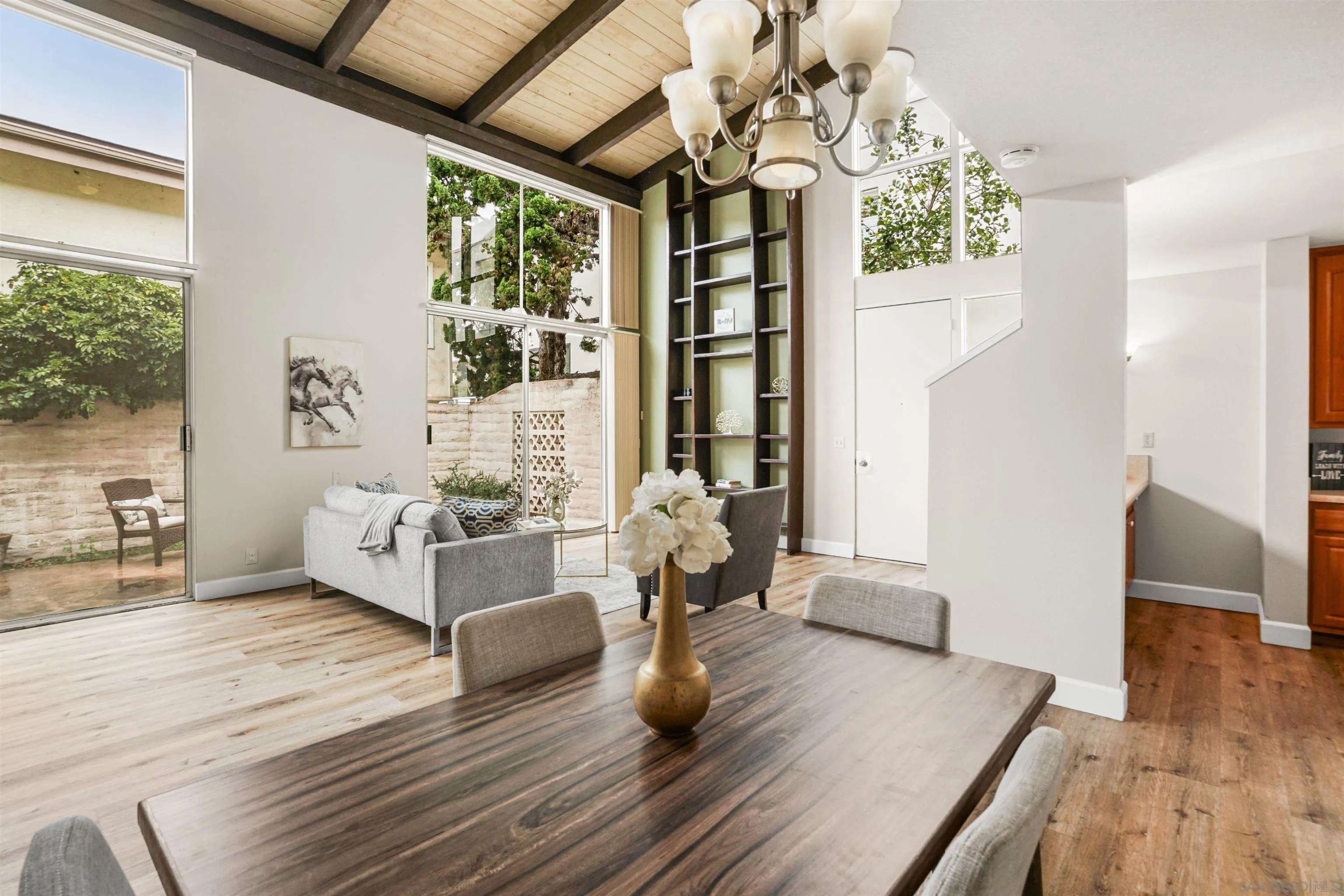 2544 Navarra Drive, Unit 5 Carlsbad, CA 92009 - Photo 13 of 39 a living room with furniture and a large window