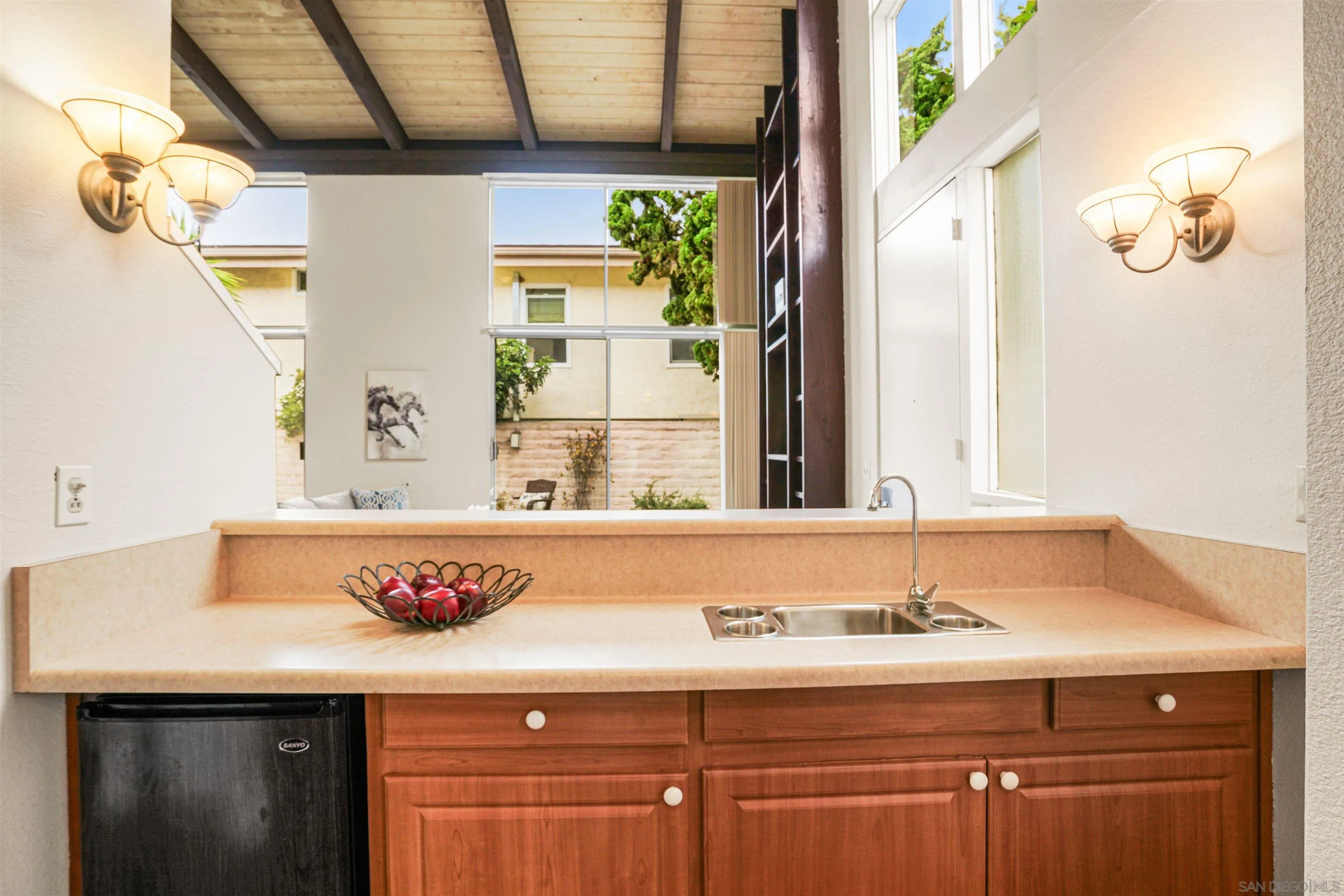 2544 Navarra Drive, Unit 5 Carlsbad, CA 92009 - Photo 19 of 39 a bathroom with a sink and a mirror