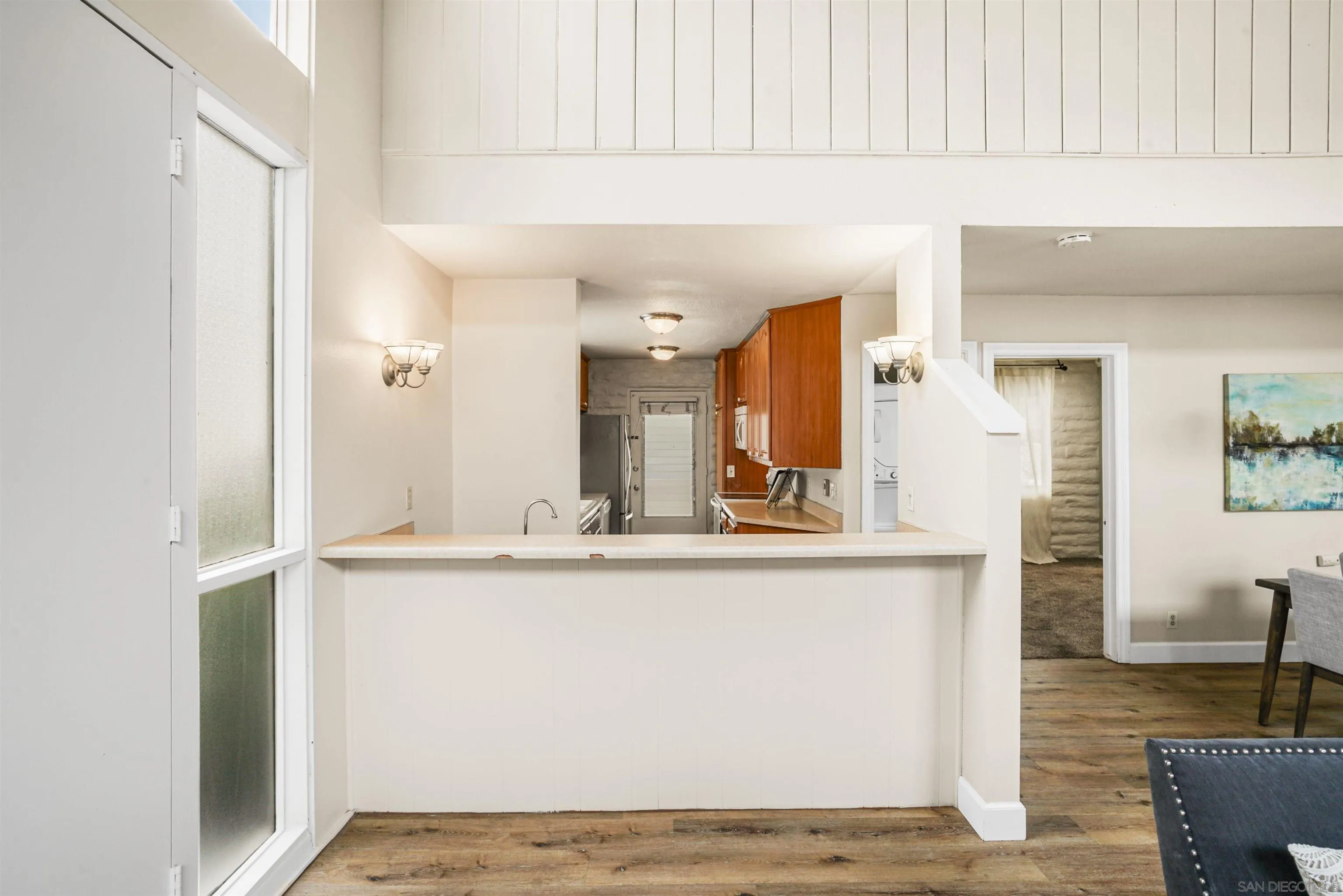 2544 Navarra Drive, Unit 5 Carlsbad, CA 92009 - Photo 20 of 39 a view of kitchen with stainless steel appliances granite countertop refrigerator sink and stove