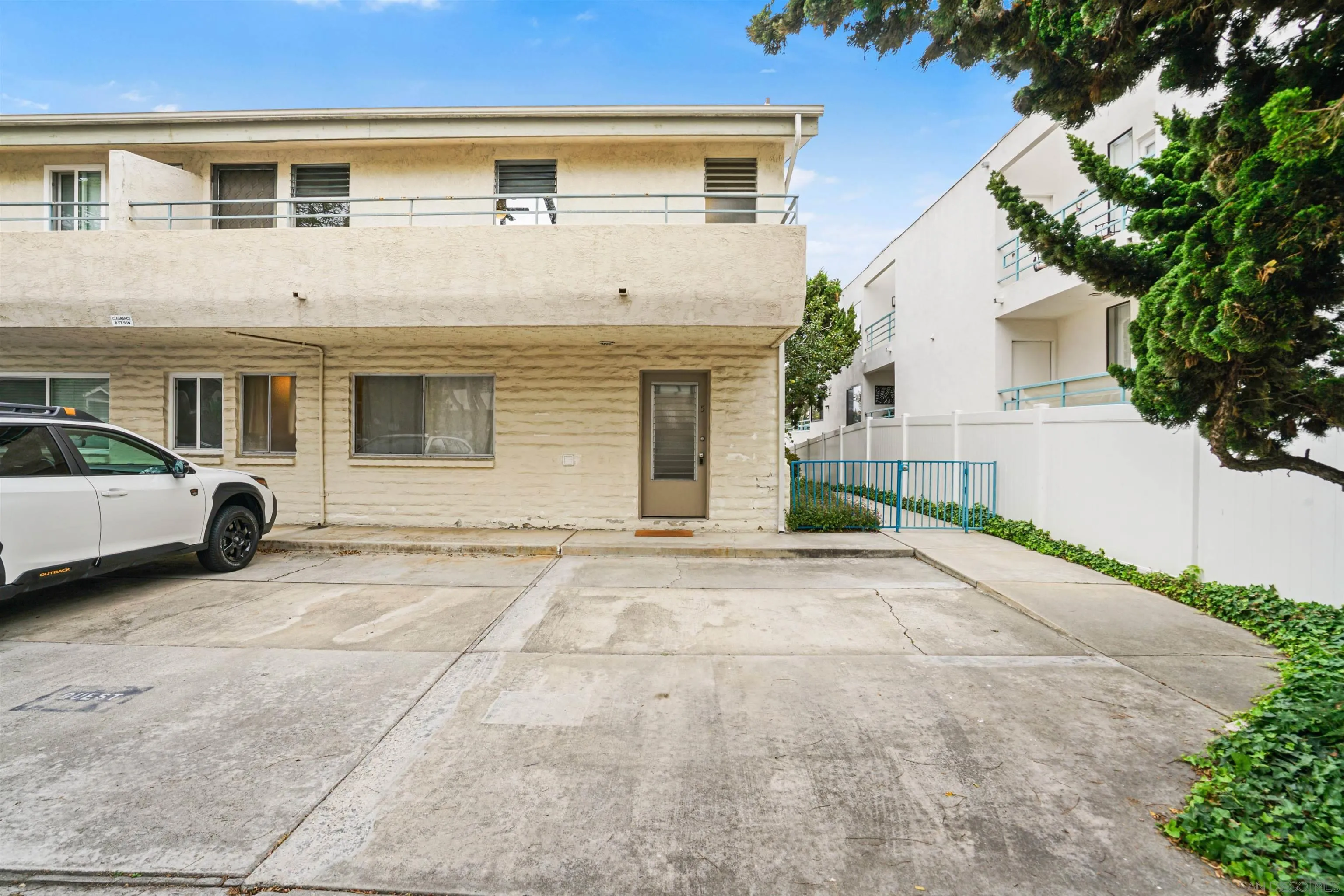 2544 Navarra Drive, Unit 5 Carlsbad, CA 92009 - Photo 27 of 39 a view of a white house