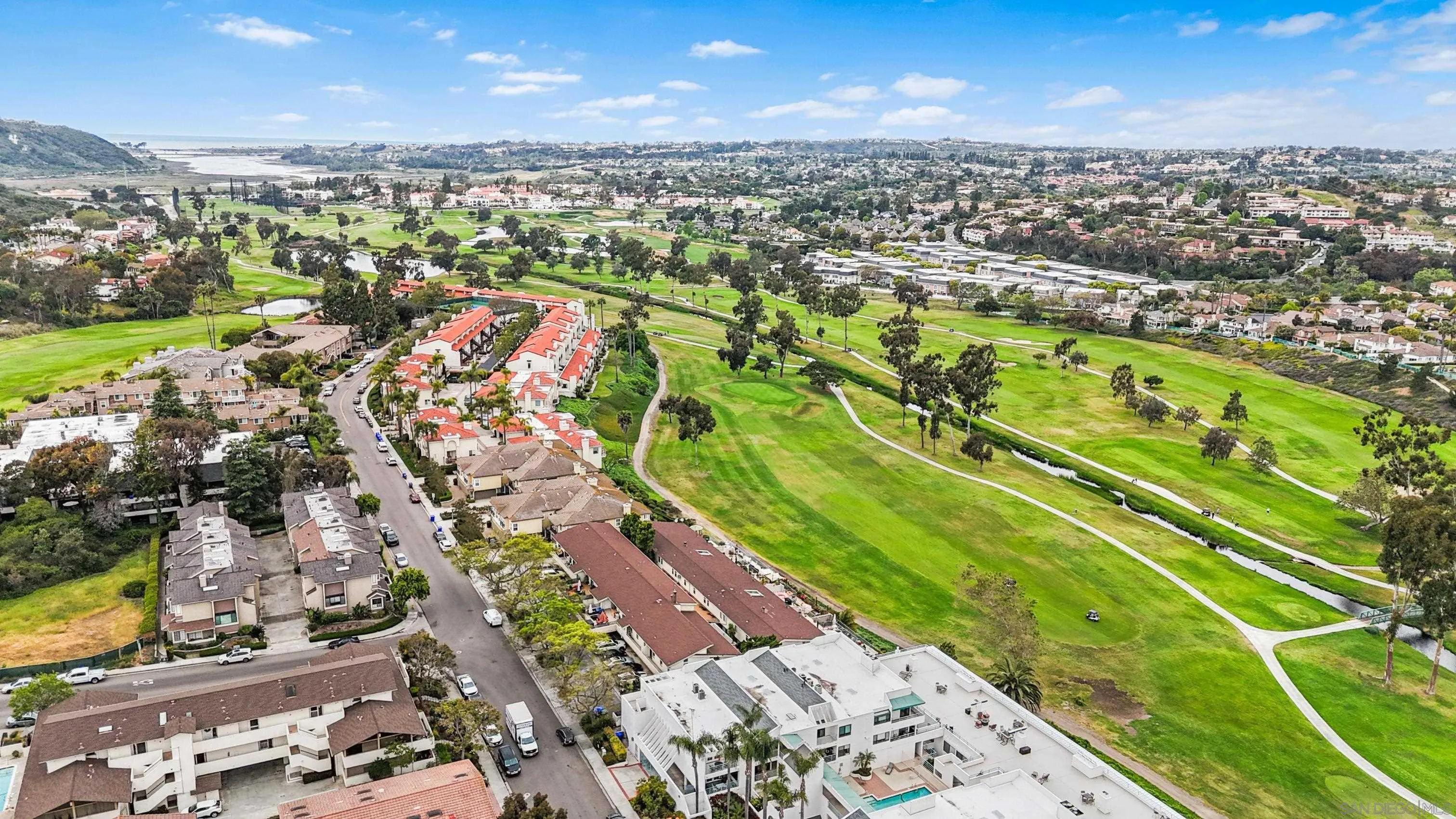 2544 Navarra Drive, Unit 5 Carlsbad, CA 92009 - Photo 35 of 39 an aerial view of residential houses with outdoor space