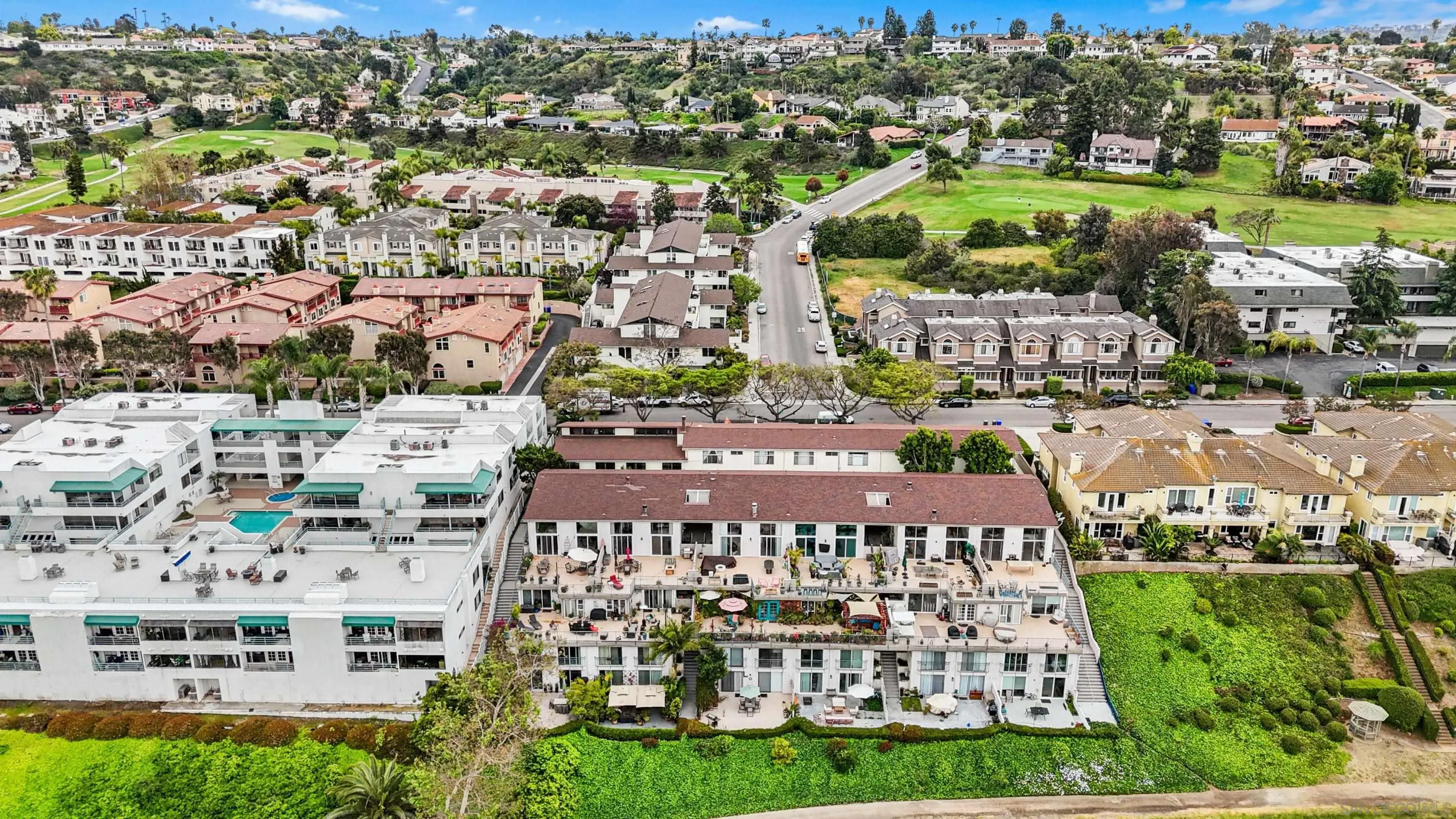 2544 Navarra Drive, Unit 5 Carlsbad, CA 92009 - Photo 36 of 39 a view of a city with tall buildings