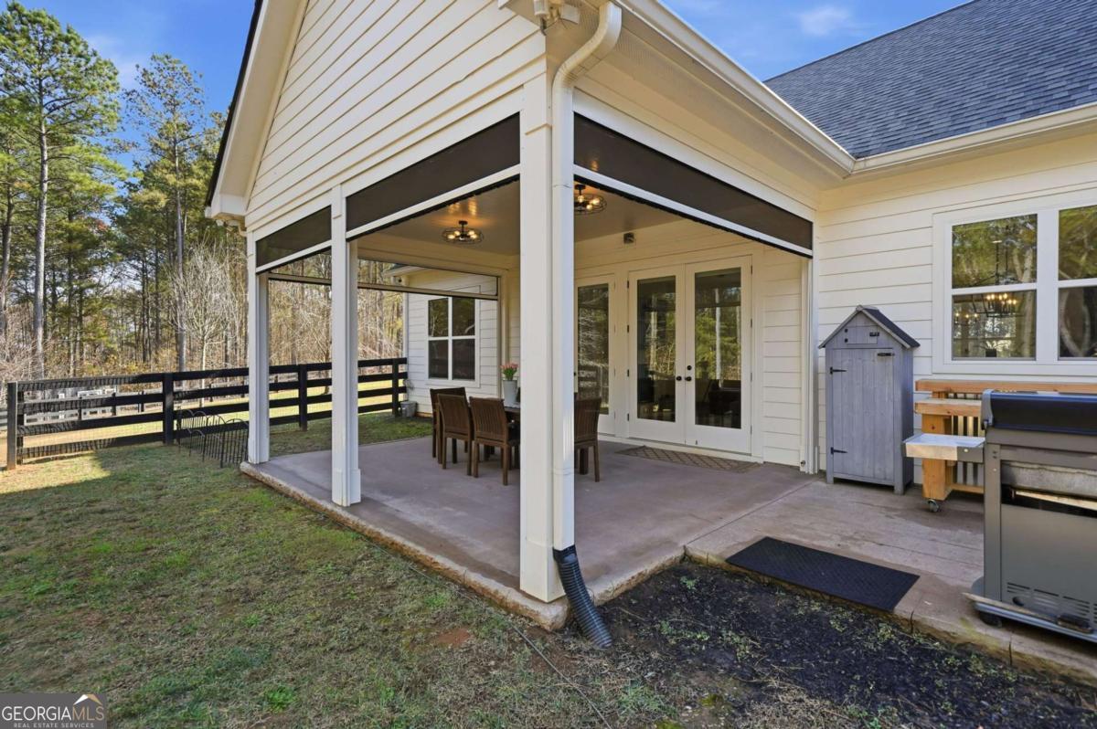 1950 Damascus Road Ball Ground, GA 30107 - Photo 21 of 29 a view of a house with backyard and porch