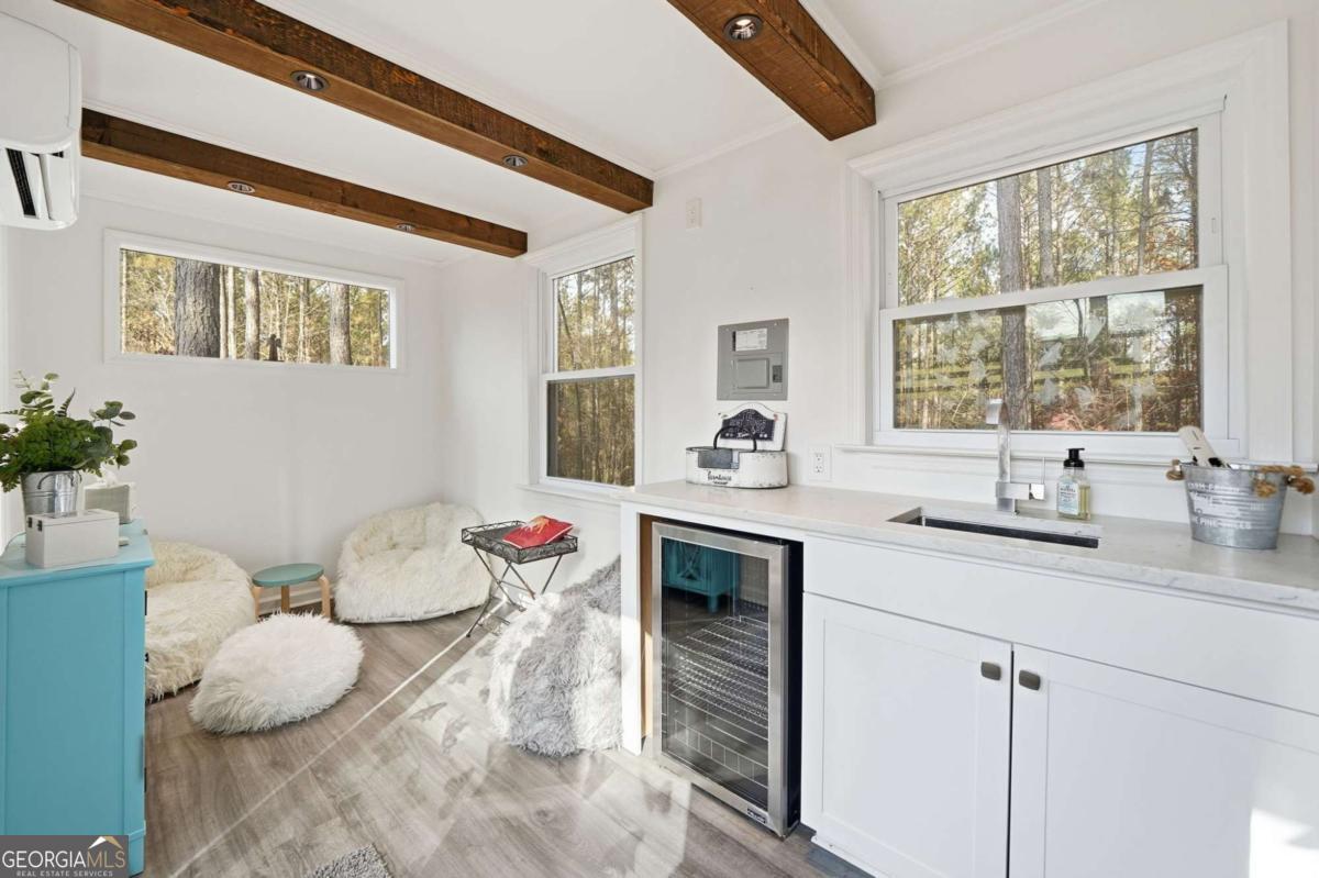1950 Damascus Road Ball Ground, GA 30107 - Photo 23 of 29 a kitchen with a sink and a stove