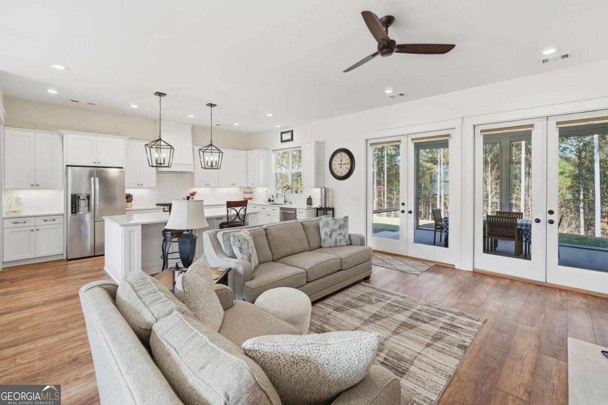 1950 Damascus Road Ball Ground, GA 30107 - Photo 8 of 29 a living room with furniture kitchen view and a window
