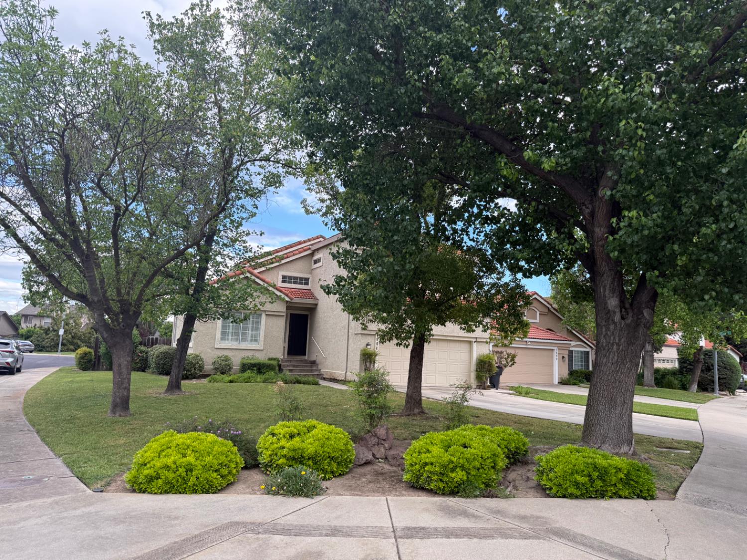 1004 Shasta Avenue Modesto, CA 95358 - Photo 2 of 37 a front view of a house with garden