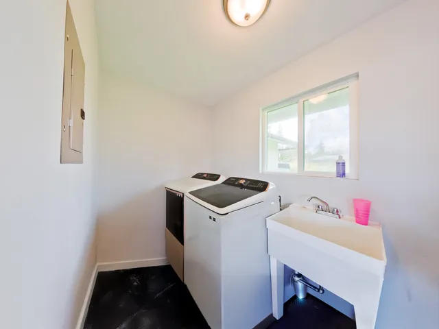 a view of a chairs and table in a room