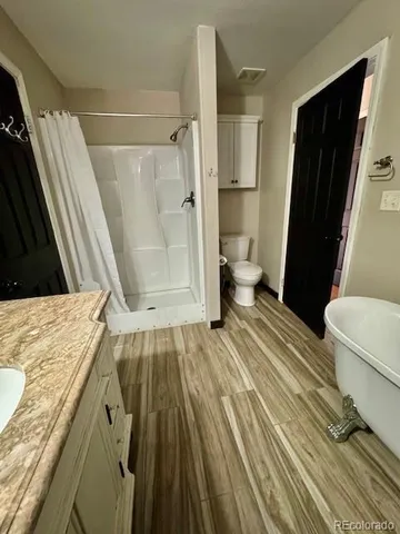 a bathroom with a sink and a toilet