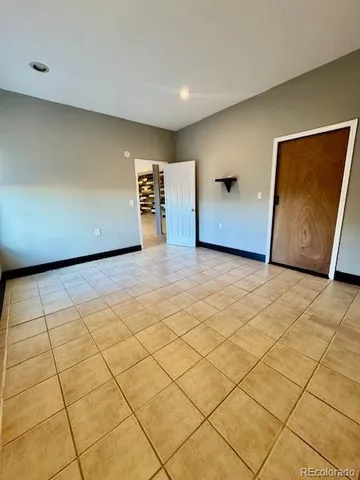 a view of a backyard with wooden floor