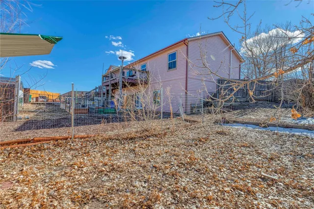 a view of a yard with an outdoor space