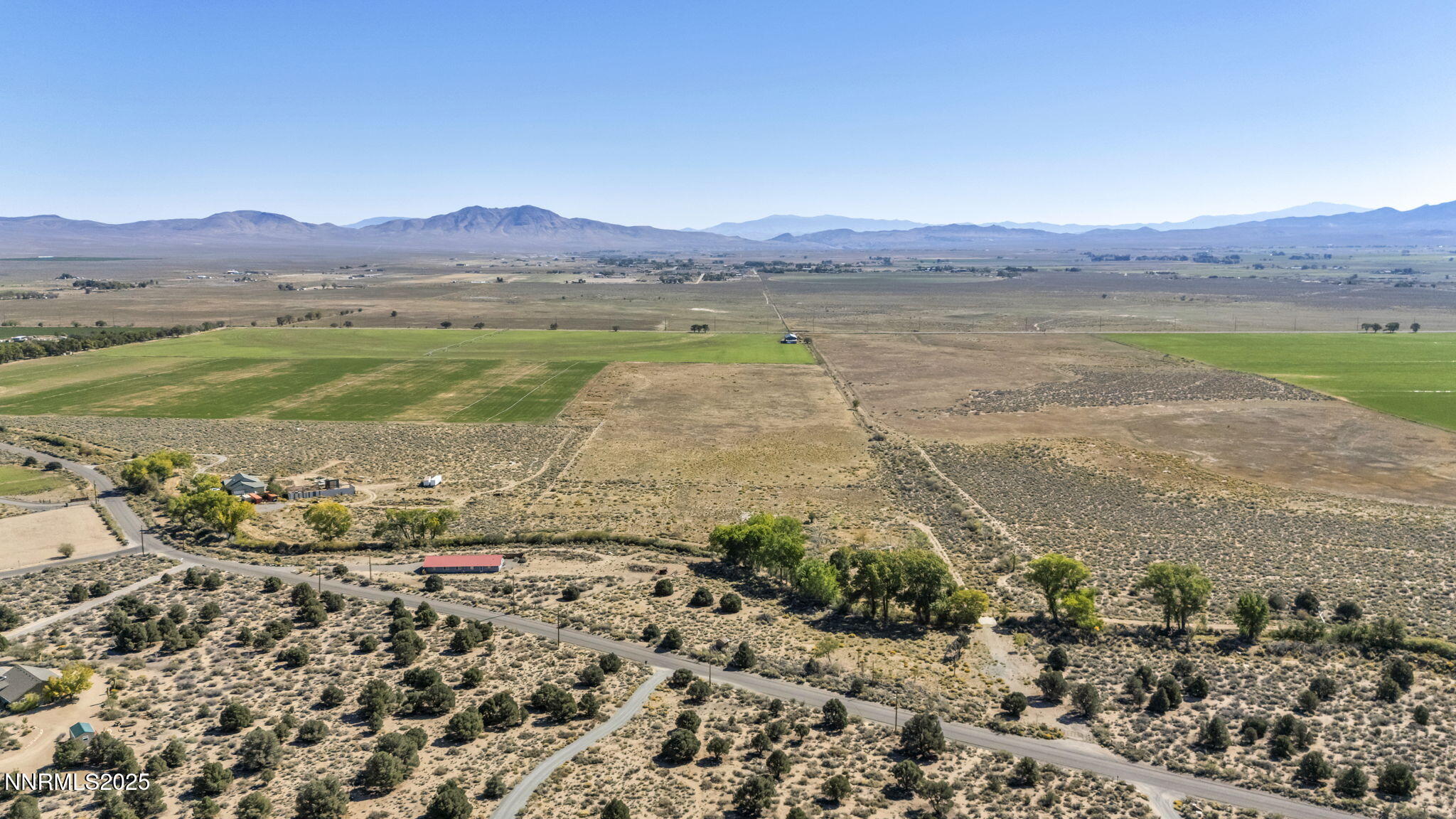 456 Upper Colony Road Smith Valley, NV 89444 - Photo 13 of 15 a view of a lake with mountains in the background