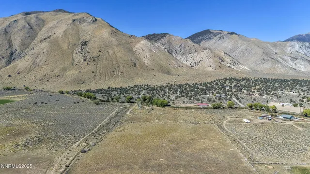 a view of a road with a mountain in the background