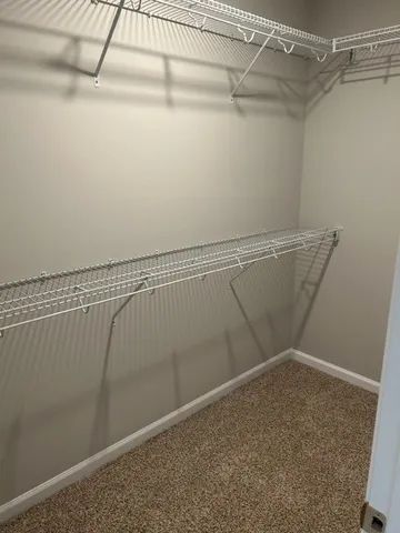 a view of a room with racks on the wall