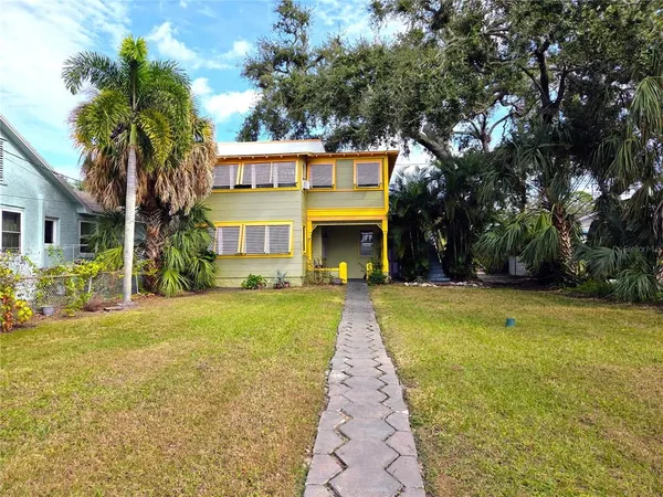 a front view of a house with swimming pool