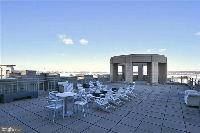 3600 South Glebe Road, Unit 601W Arlington, VA 22202 - Photo 17 of 23 a view of a terrace with furniture and city view