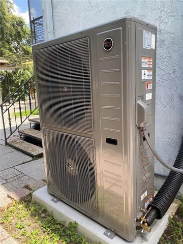 a front view of a house with parking area