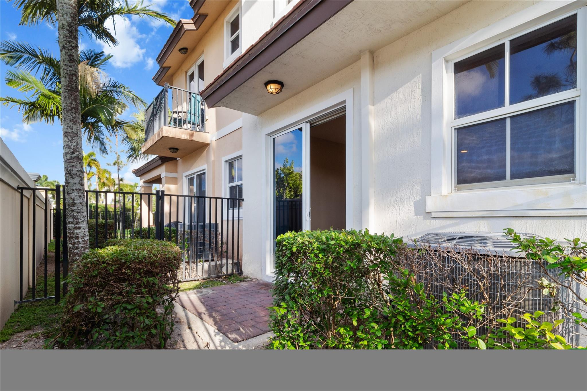 6918 Long Pine Circle Coconut Creek, FL 33073 - Photo 10 of 19 a view of a house with a street