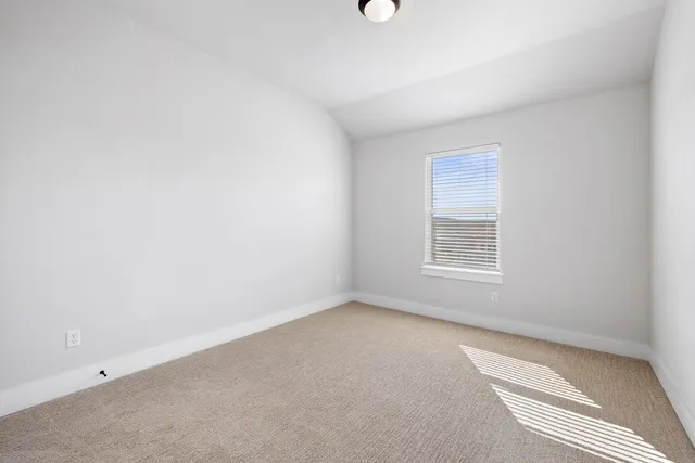 a bathroom with a sink a toilet a shower and a mirror