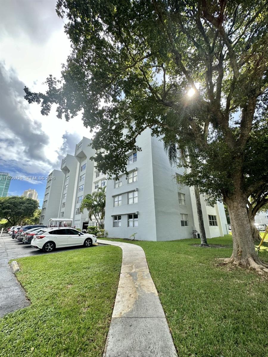9001 Southwest 77th Avenue, Unit C604 Miami, FL 33156 - Photo 17 of 17 a view of a park with large trees