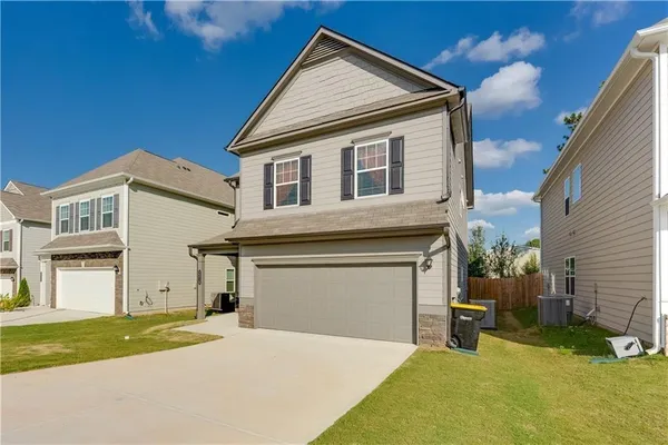 a house view with a outdoor space