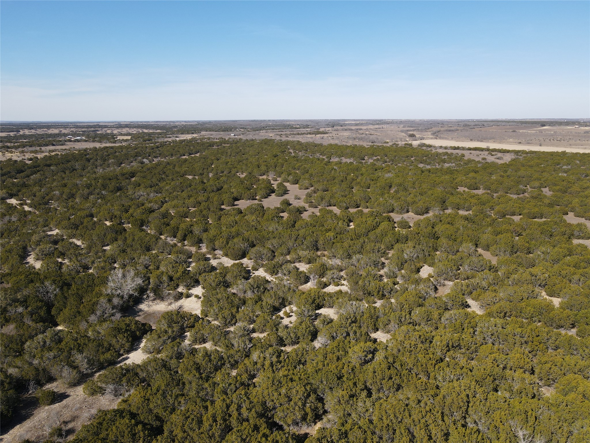 1 County Road 111 Hamilton, TX 76531 - Photo 11 of 32 an aerial view of residential houses with outdoor space and trees