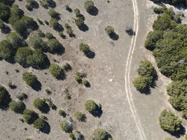 a view of a backyard of the house