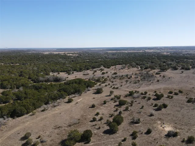 a view of city with ocean