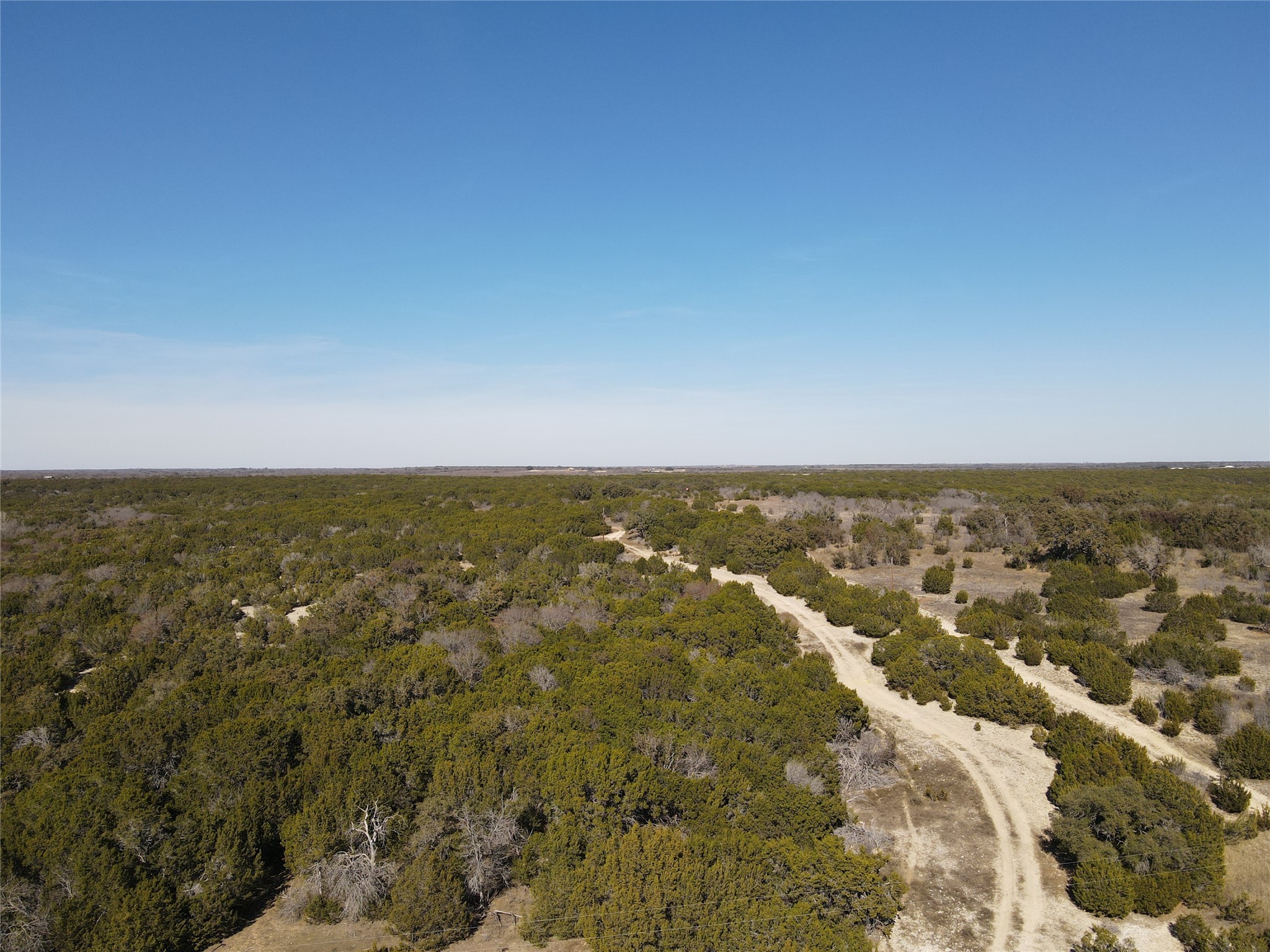 1 County Road 111 Hamilton, TX 76531 - Photo 21 of 32 an aerial view of residential houses with outdoor space