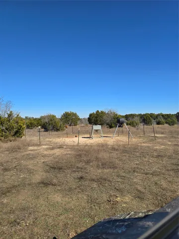 a view of yard with trees