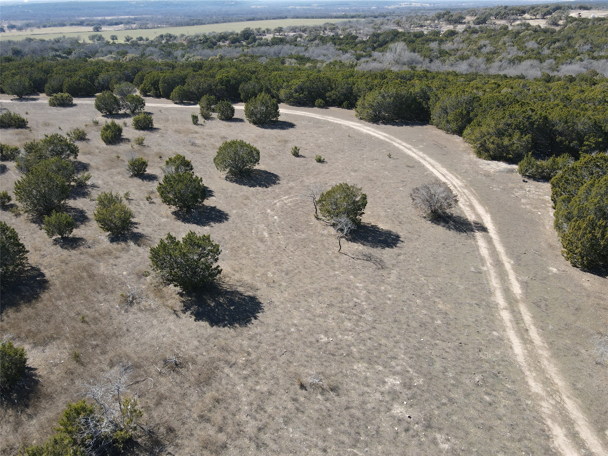 1 County Road 111 Hamilton, TX 76531 - Photo 3 of 32 a view of a lake with mountain view