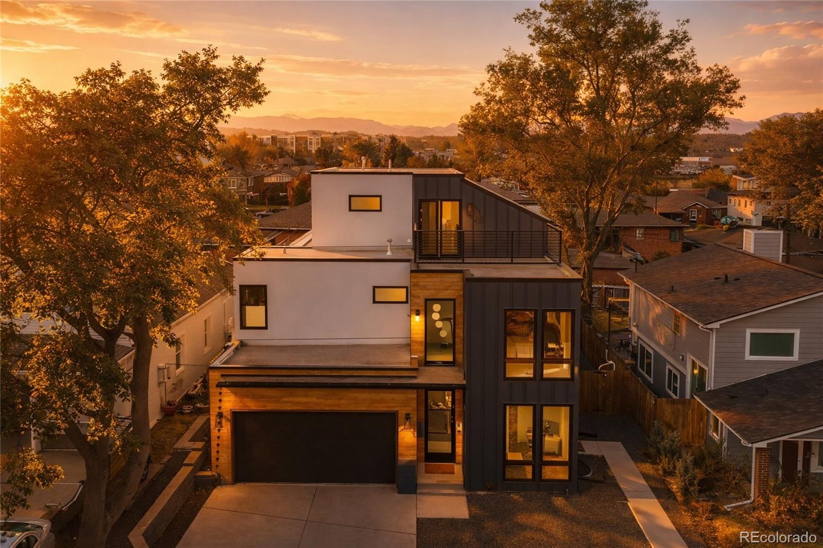 1655 Wolff Street Denver, CO 80204 - Photo 1 of 50 a front view of a house with mountain view
