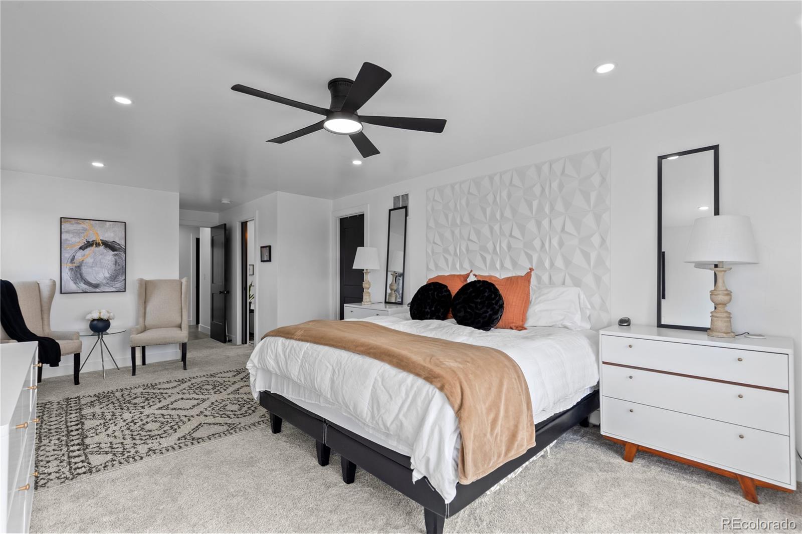 1655 Wolff Street Denver, CO 80204 - Photo 23 of 50 a bedroom with a bed and a table in it