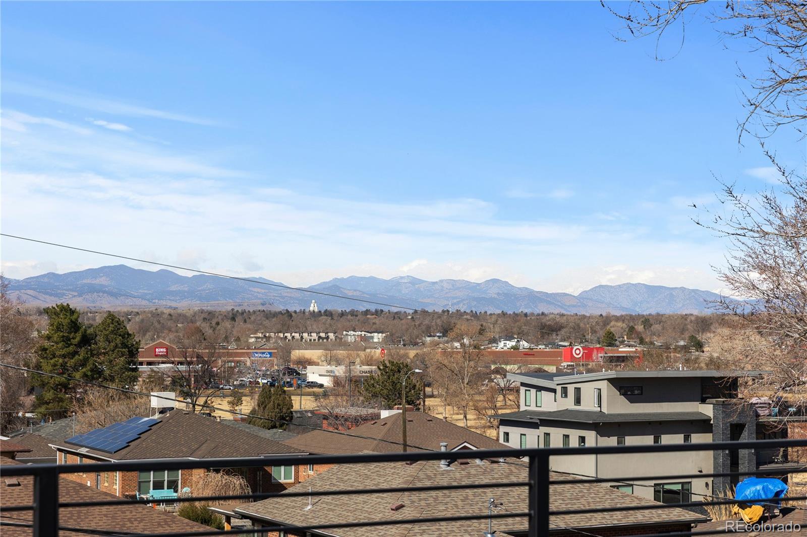 1655 Wolff Street Denver, CO 80204 - Photo 38 of 50 a view of a city with mountain