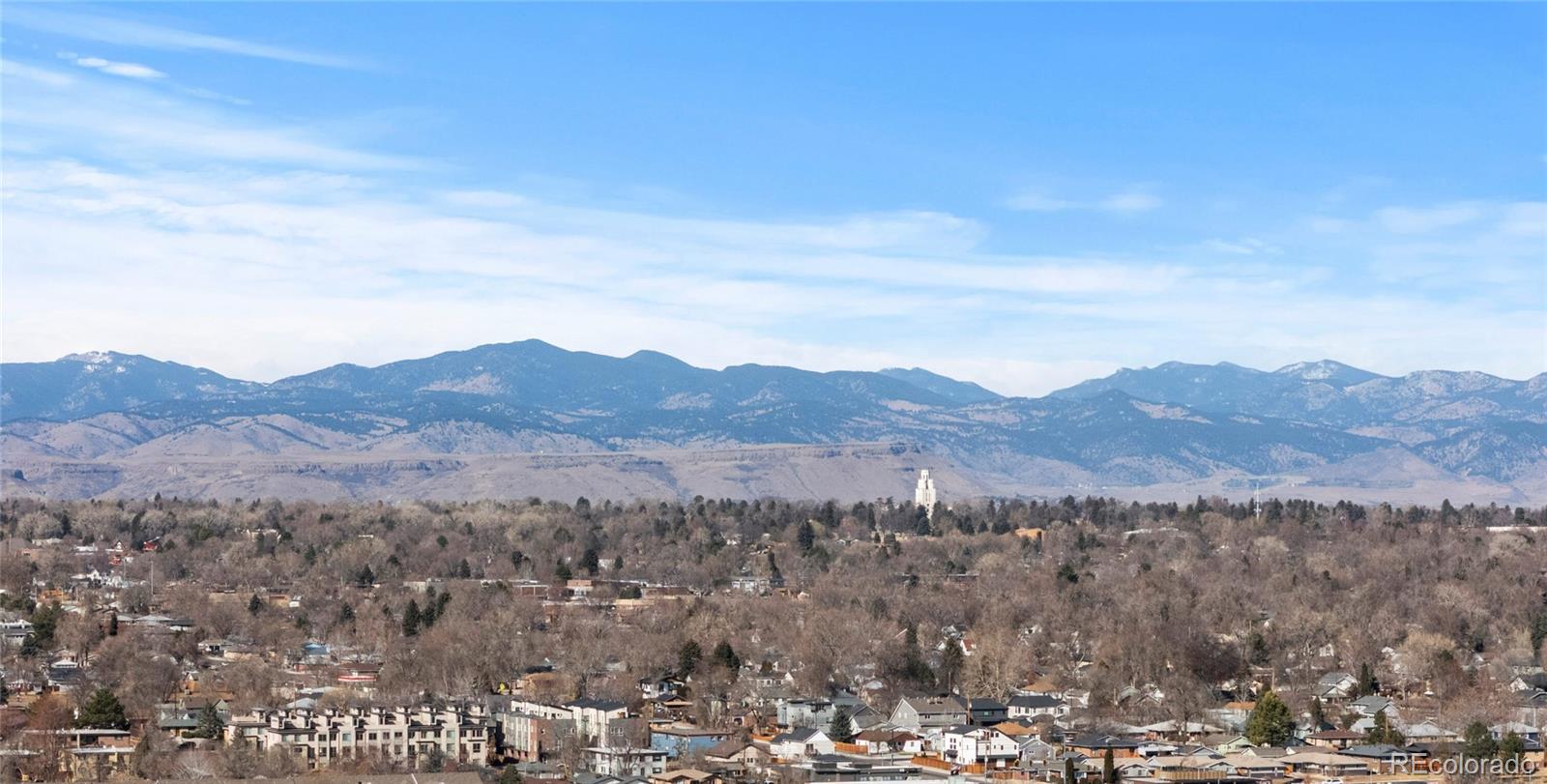 1655 Wolff Street Denver, CO 80204 - Photo 41 of 50 a view of a town with mountains in the background