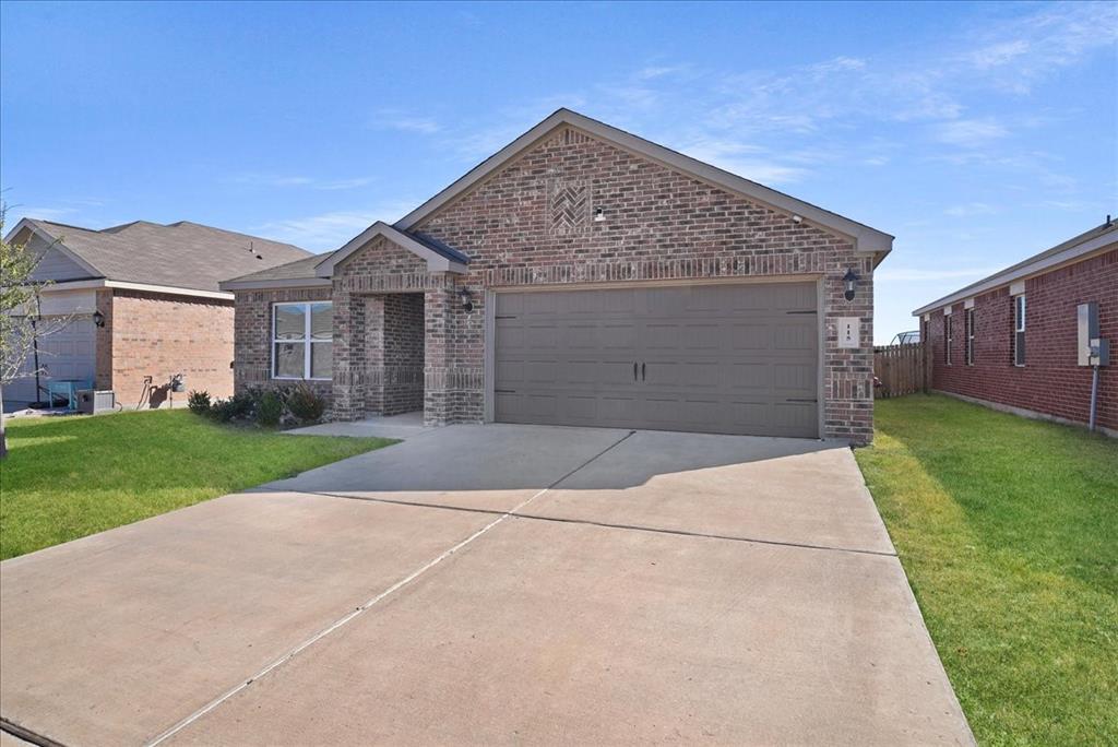 115 Sammy Fowler Avenue Venus, TX 76084 - Photo 2 of 34 front view of house with a yard