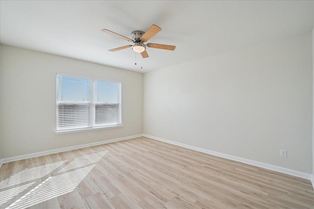 115 Sammy Fowler Avenue Venus, TX 76084 - Photo 24 of 34 a view of an empty room with a window