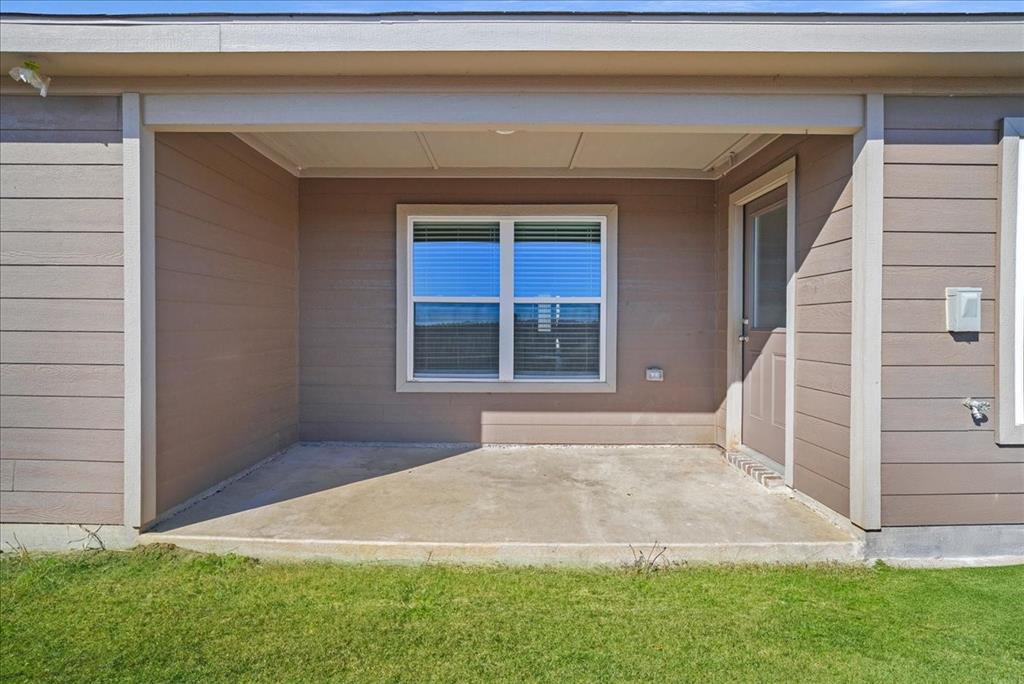 115 Sammy Fowler Avenue Venus, TX 76084 - Photo 28 of 34 a backyard of a house