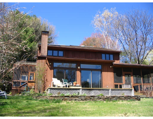 575 Station Road Amherst, MA 01002 - Photo 1 of 11 front view of a house with a yard