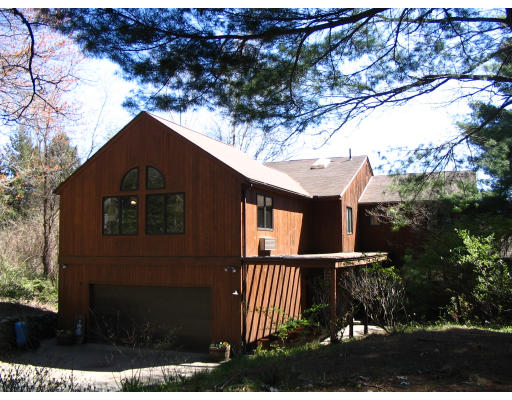 575 Station Road Amherst, MA 01002 - Photo 11 of 11 a front view of a house with a yard